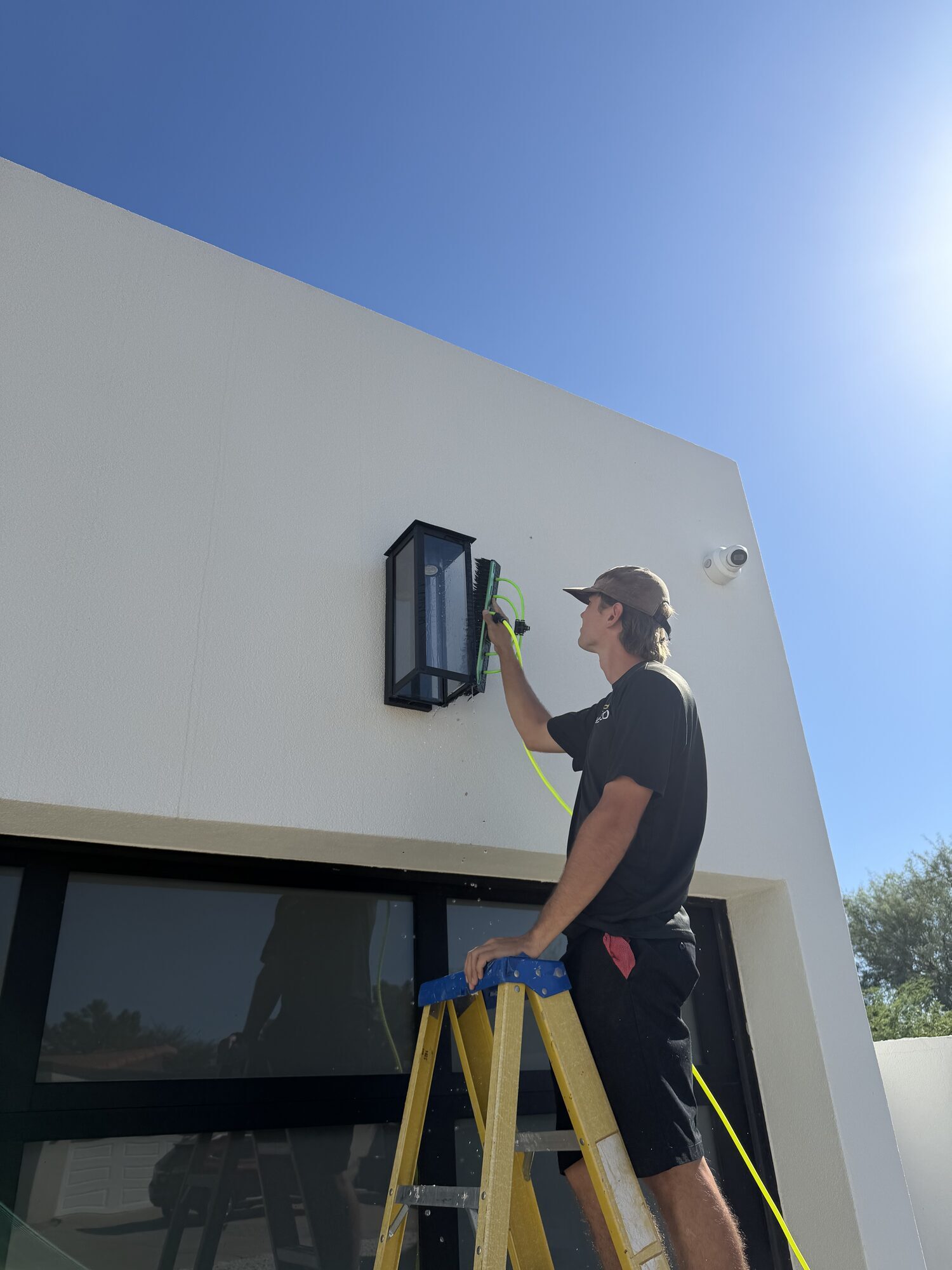 Reaching an Exterior Light Fixture
